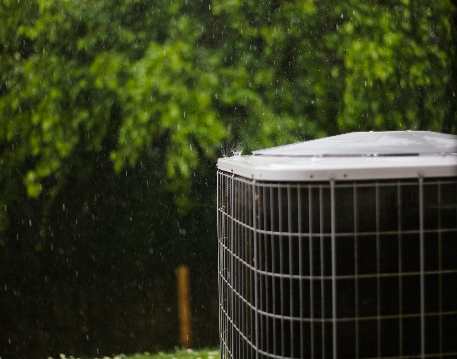 Air conditioning condenser outside a home