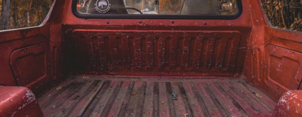 Empty pickup truck bed seen from the tailgate